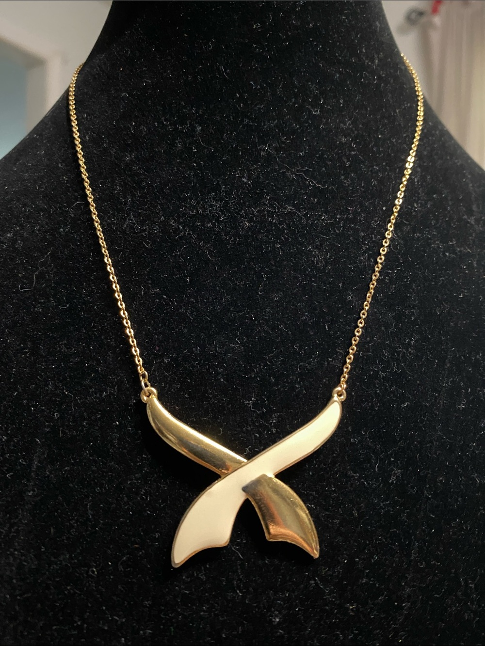 Anne Klein Gold and Cream X-Pendant Necklace